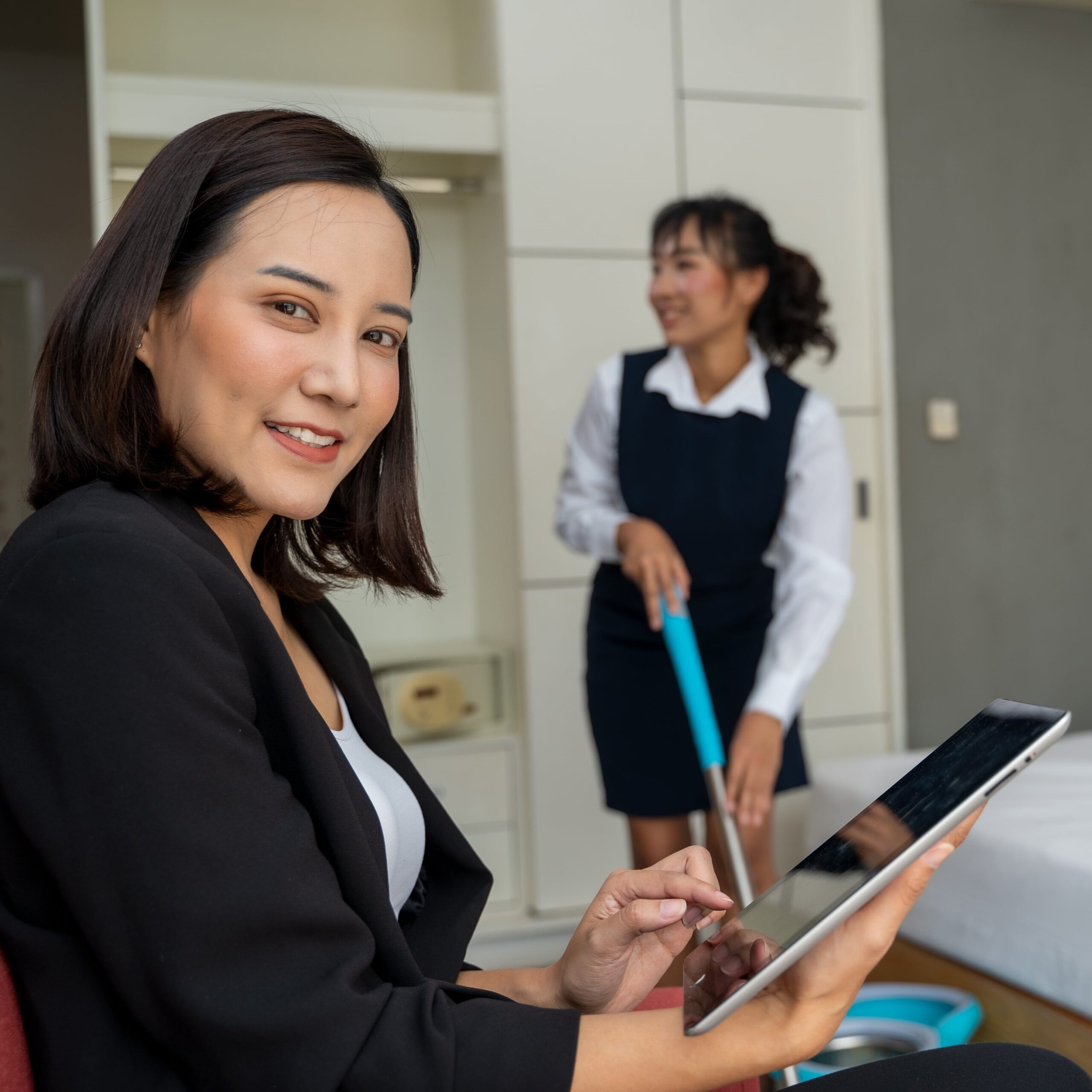 housekeeping-manager-working-on-digital-tablet-and-2025-01-07-06-05-25-utc-3-min